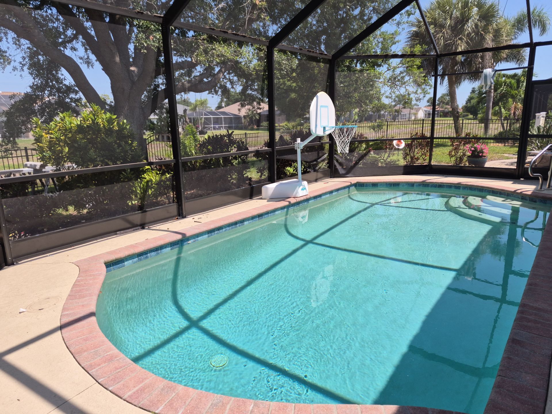 Pool cage screen enclosure with in-ground pool in Rotonda West, FL