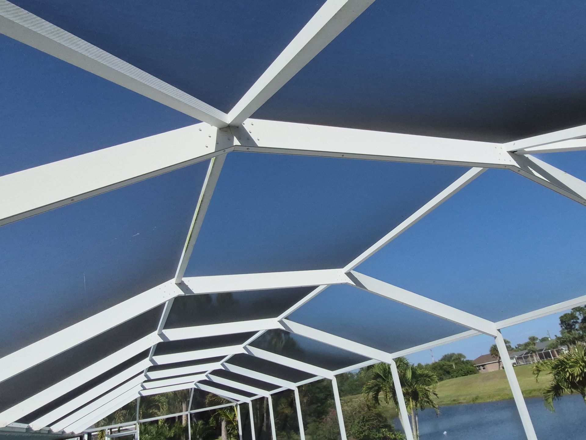 Interior view of aluminum screen enclosure roof structure in Rotonda West, FL